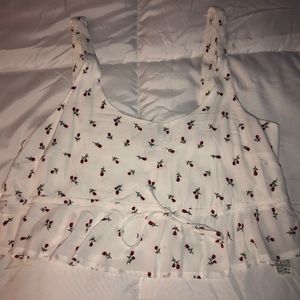 Cropped shirt with roses on it